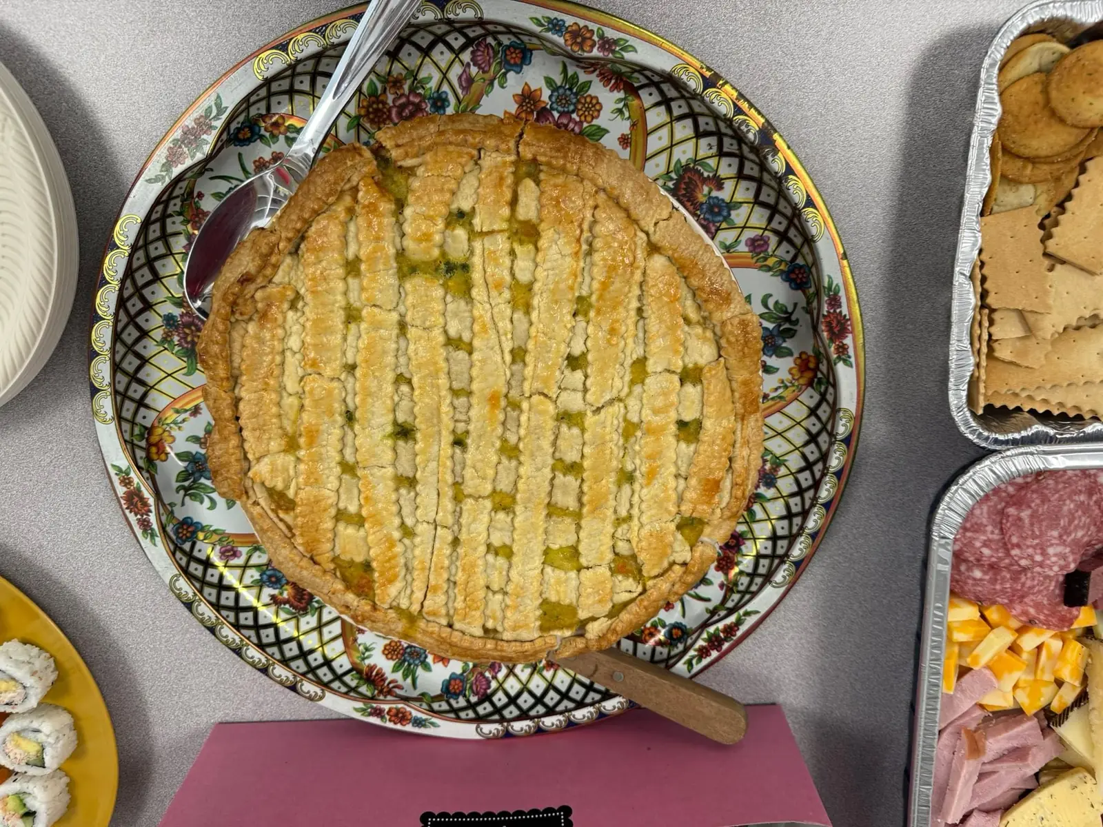 A homemade lattice pie cooked for a PCLG household.