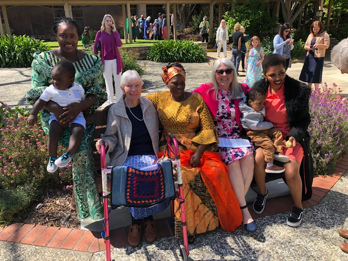 PCLG friends seated together in a garden.