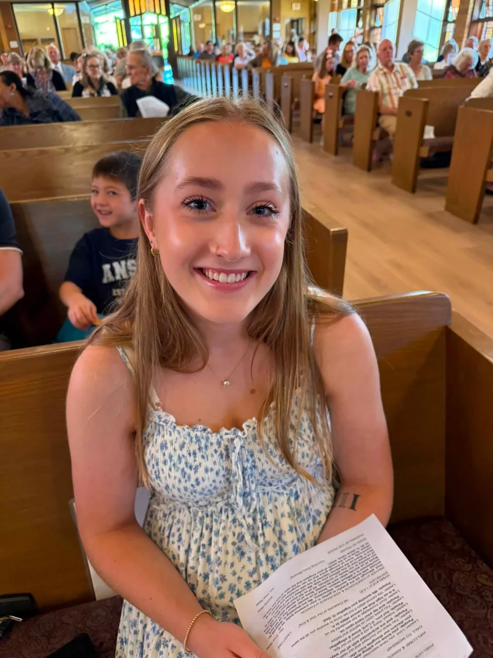 A Ministry Fellow seated in the Sanctuary before worship.