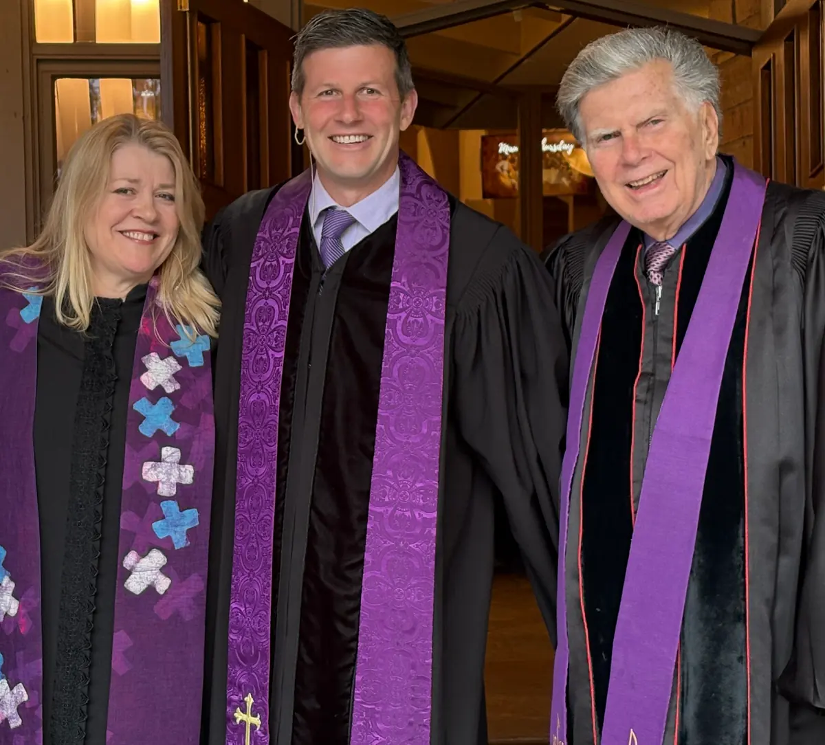 The Revs. Erica Rader, David Watermulder, and Jack Longley together at PCLG in worship robes.