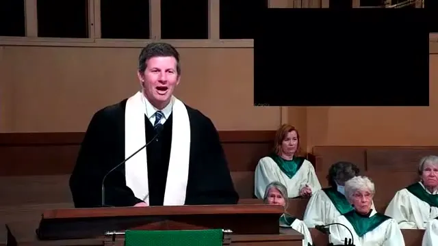 Rev. Dr. David G. Watermulder at the start of Love Your Neighbor As Yourself