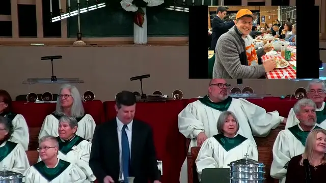 Rev. Dr. David G. Watermulder at the start of The Problem of Pain in the World